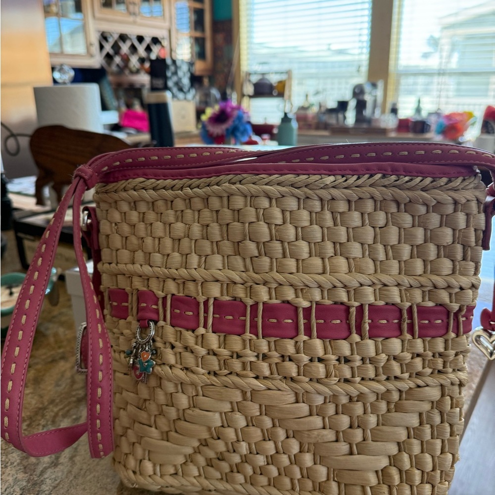 Brighton-Pink Leather Woven Crossbody Bag with Metallic Flower Details.
